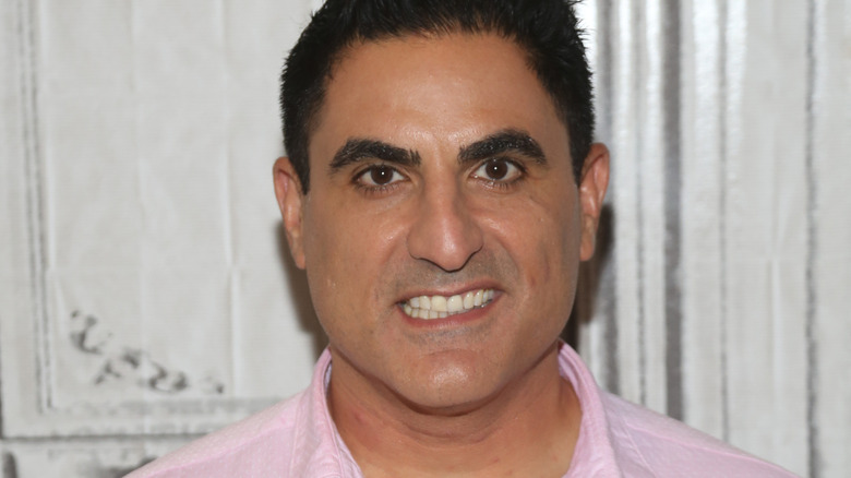 Reza Farahan posing for cameras