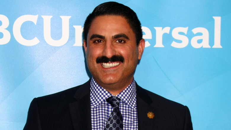 Reza Farahan posing for cameras