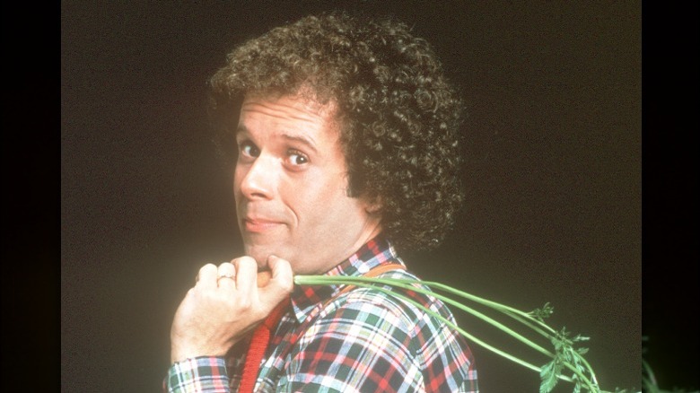 Richard Simmons holding carrot
