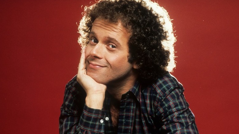 Richard Simmons hand on chin