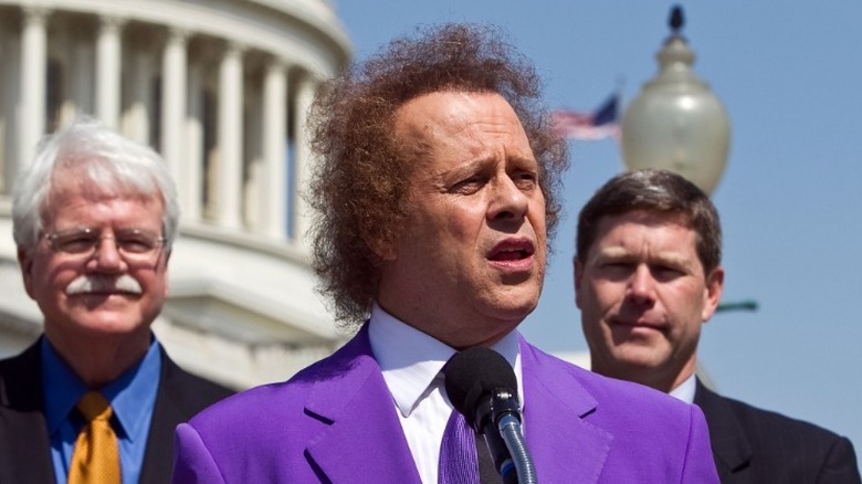 Richard Simmons talking into mic