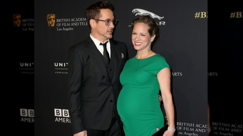 Robert Downey Jr. with a pregnant Susan Downey