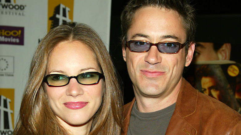 Susan Downey posing with Robert Downey Jr.