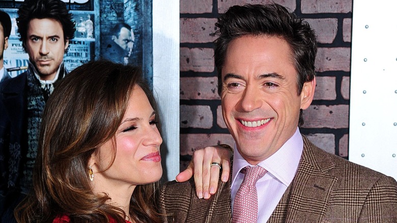 Susan Downey smiling at Robert Downey Jr.