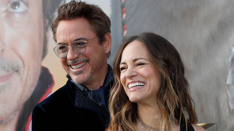 Robert Downey Jr. holding Susan Downey