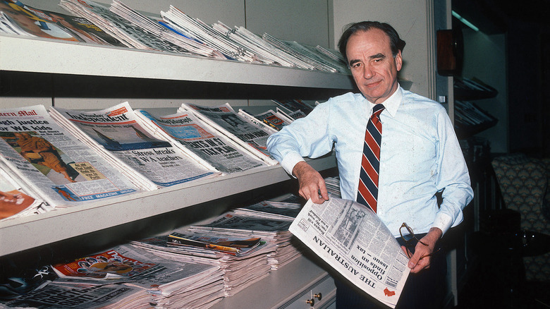 Rupert Murdoch with his newspapers