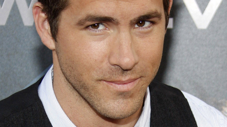Ryan Reynolds wearing a vest