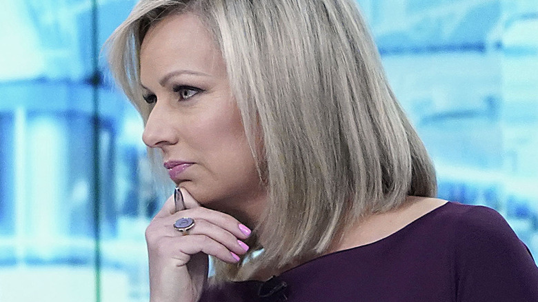 Sandra Smith chin on hand 