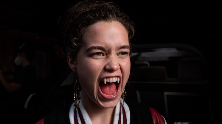 Sarah Catherine Hook baring her fangs in a scene from First Kill