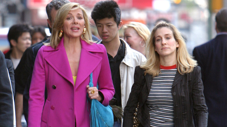 Samantha and Carrie walking and talking together