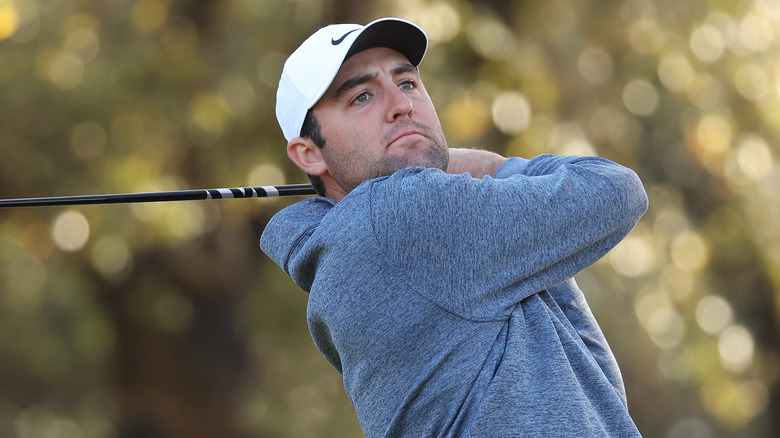 Scottie Scheffler playing golf