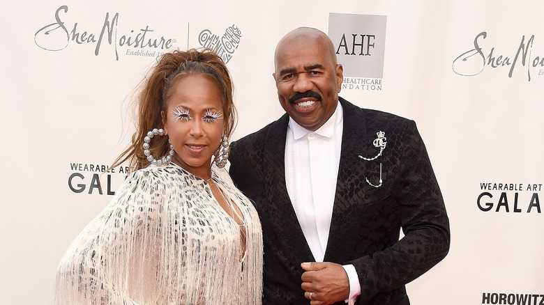 Marjorie Harvey and Steve Harvey posing together