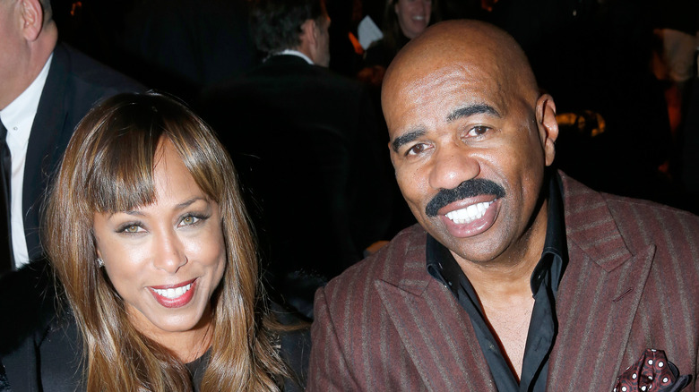 Steve Harvey smiling with wife Marjorie Harvey