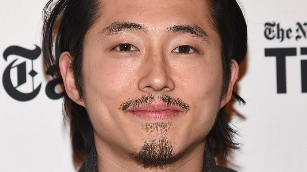 Steven Yeun smiling