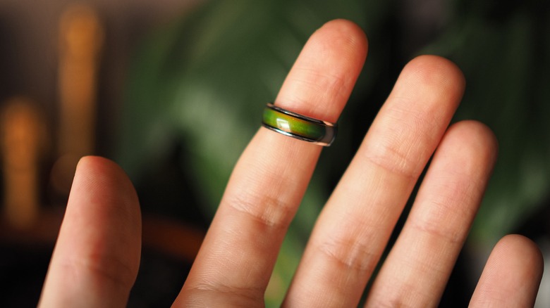 Mood ring on index finger