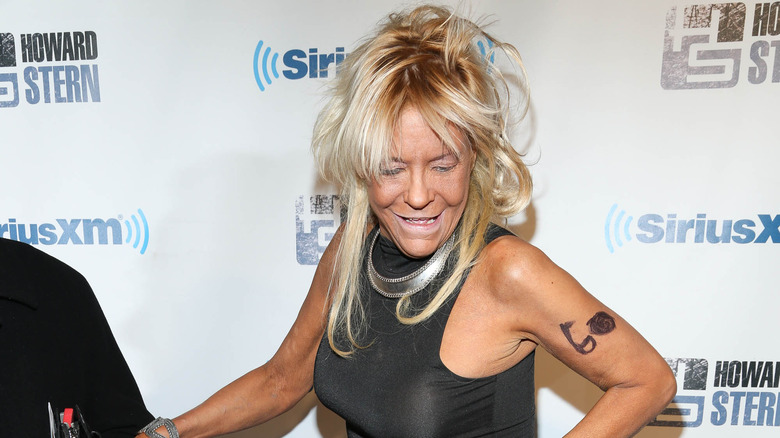 Tan Mom smiling at Howard Stern's Birthday Bash