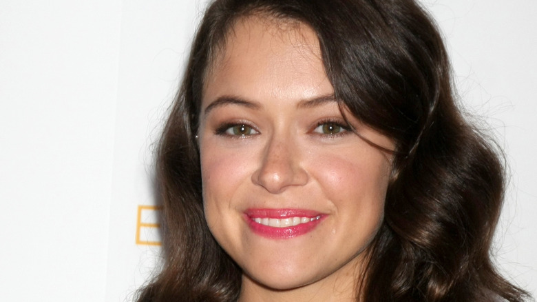 Tatiana Maslany smiling with long hair