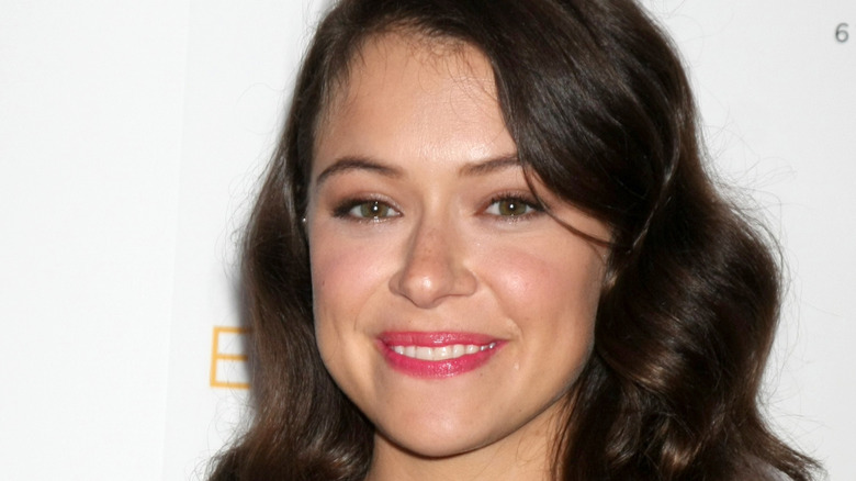 Tatiana Maslany smiling with long hair