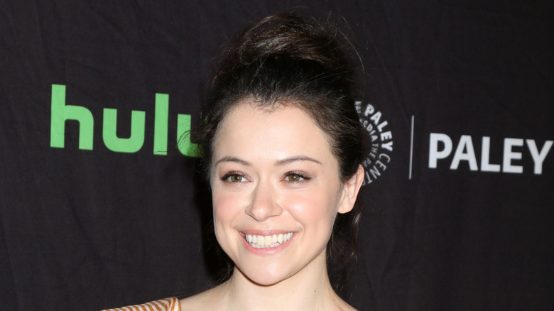 Tatiana Maslany smiling at event