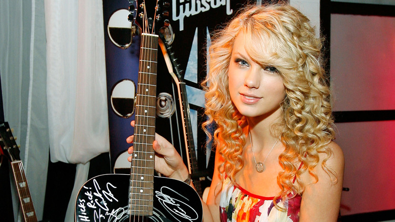 Taylor Swift with a guitar