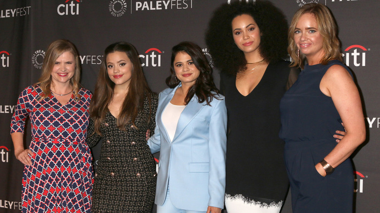 Charmed cast and writers posing
