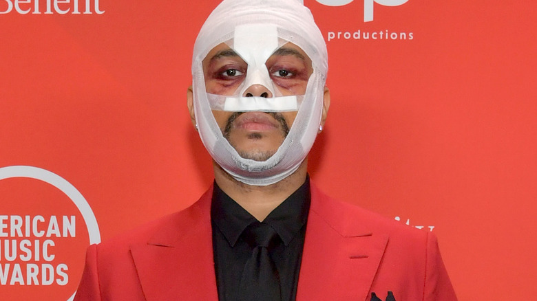 The Weeknd posing in bandages