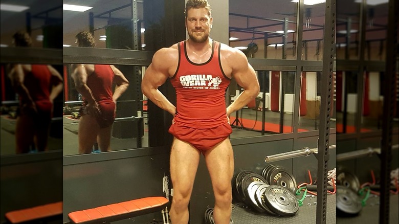 Olivier working out in red outfit