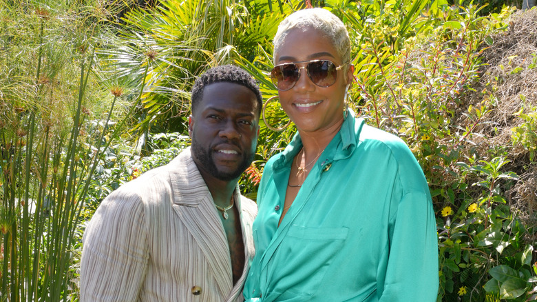 Kevin Hart and Tiffany Haddish posing together 