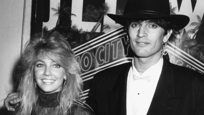 Heather Locklear and Tommy Lee smiling