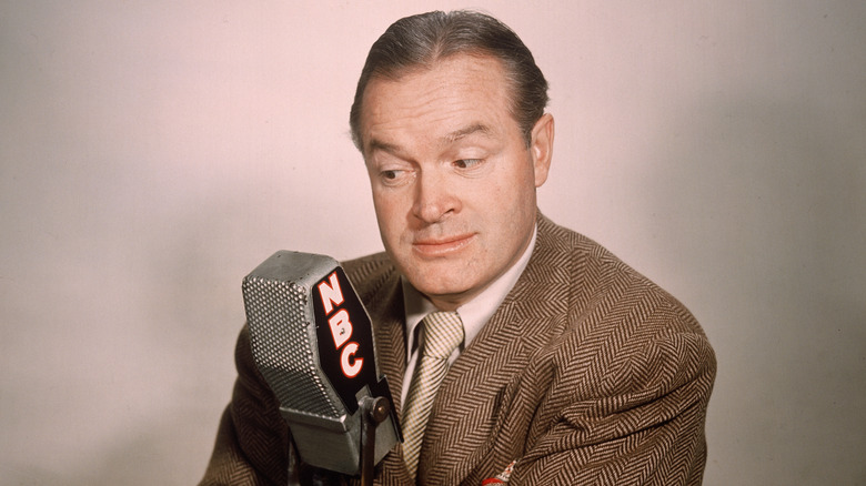 Bob Hope posing with a microphone