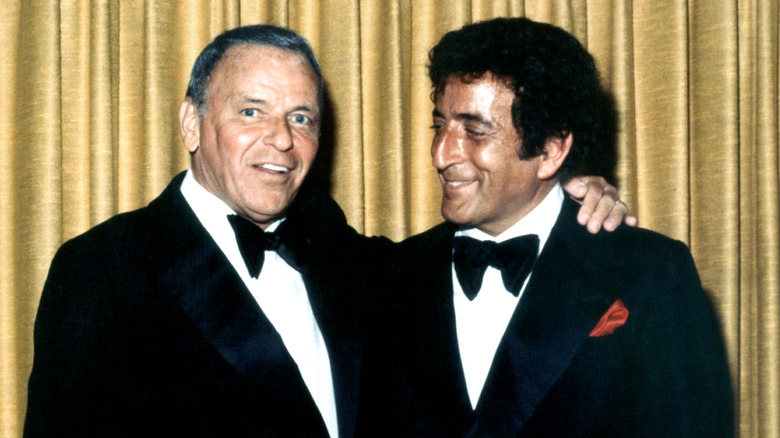 Tony Bennett and Frank Sinatra smiling 