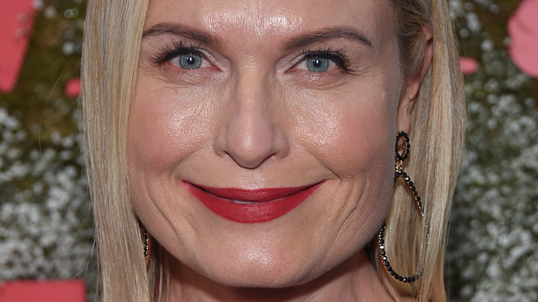 Tosca Musk in red lipstick