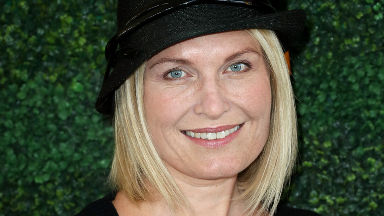 Tosca Musk wearing black hat