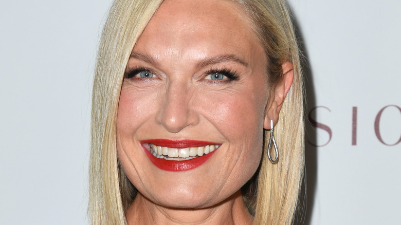 Tosca Musk in red lipstick