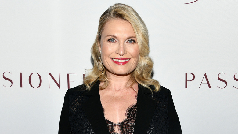 Tosca Musk in red lipstick