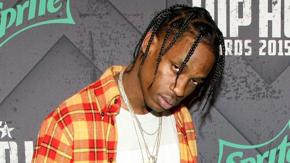 Travis Scott hanging his head 
