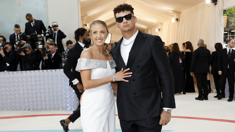Brittany and Patrick Mahomes posing at the Met Gala in 2023.