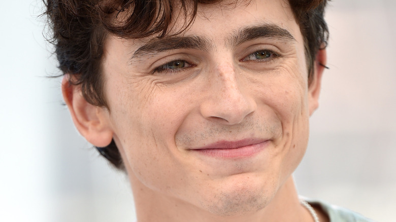 Smiling Timothée Chalamet at the 74th annual Cannes Film Festival 2021