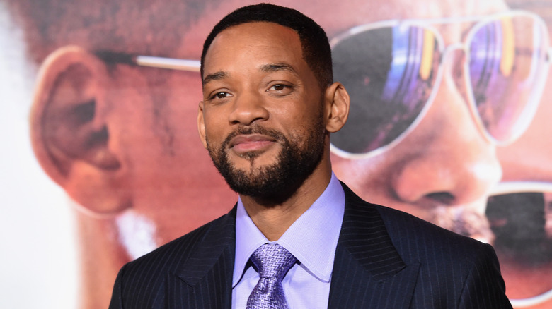 Will Smith posing for cameras