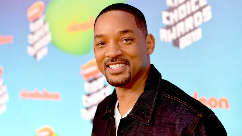 Will Smith posing for cameras