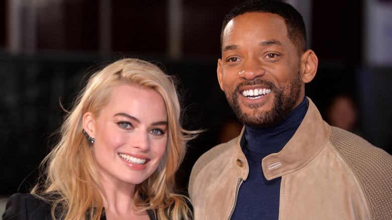 Margot Robbie and Will Smith smiling
