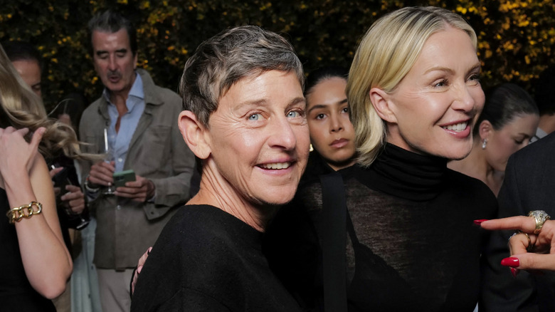 Ellen DeGeneres and Portia de Rossi smiling