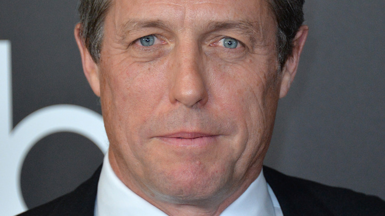 Hugh Grant smiling