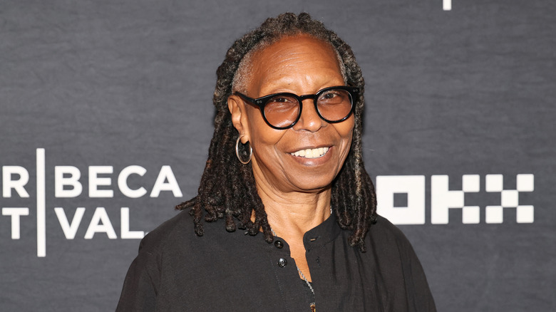 Whoopi Goldberg smiling.