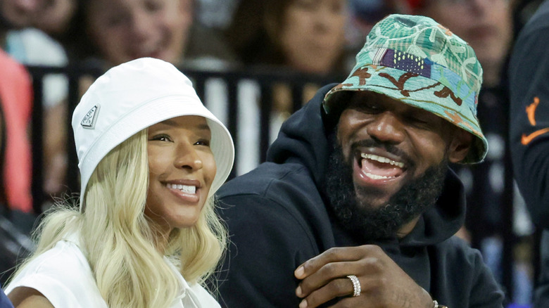 LeBron James smiling while looking at Savannah James