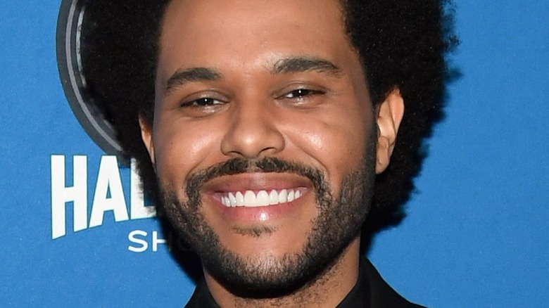 The Weeknd Ditches His 'After Hours' Red Suit for a New Look at 2021  Billboard Music Awards