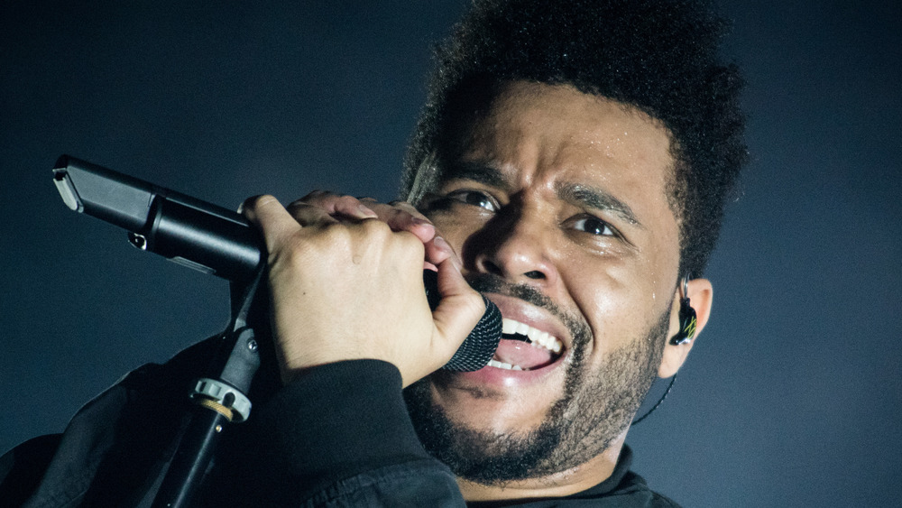 The Weeknd performing