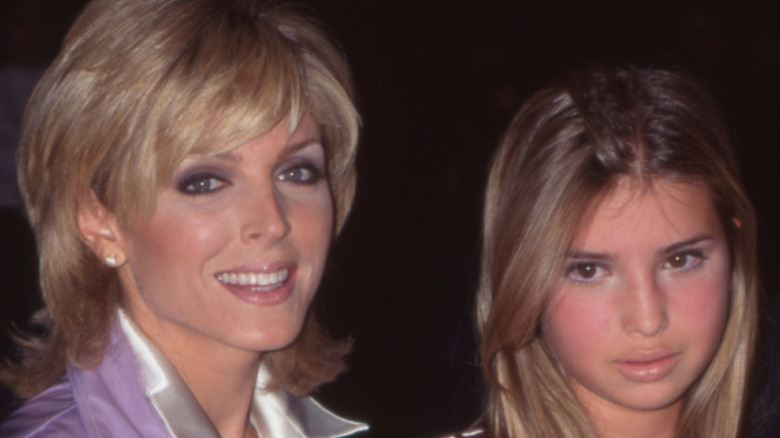 Marla Maples and Ivanka Trump posing for cameras