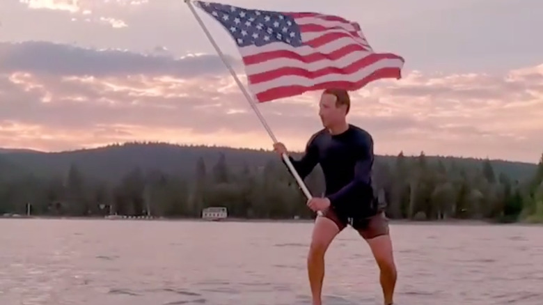Mark Zuckerberg surfing on a lake