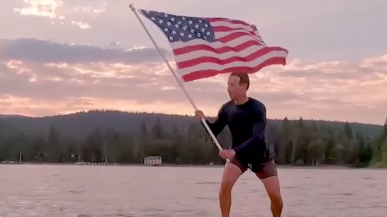 Mark Zuckerberg surfing on a lake